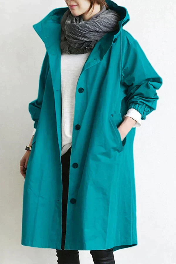 Women’s raincoat | Lightweight waterproof jacket | Hooded | Longline fit | Button closure