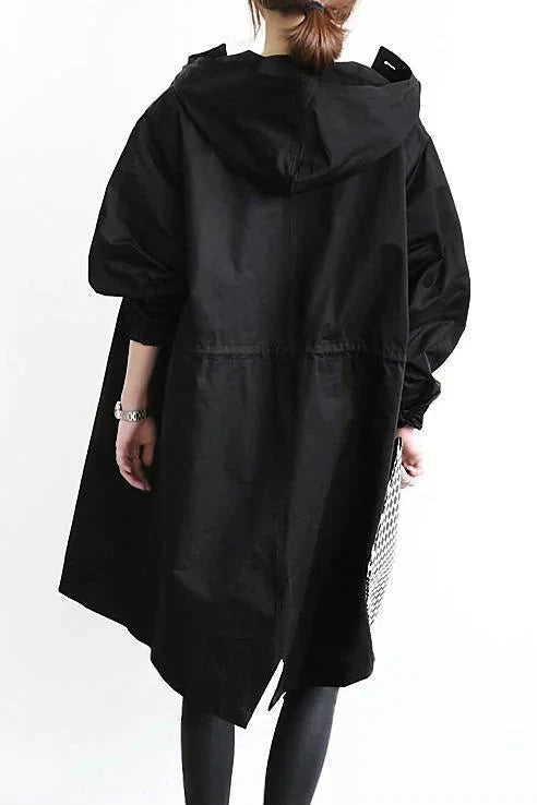 Women’s raincoat | Lightweight waterproof jacket | Hooded | Longline fit | Button closure