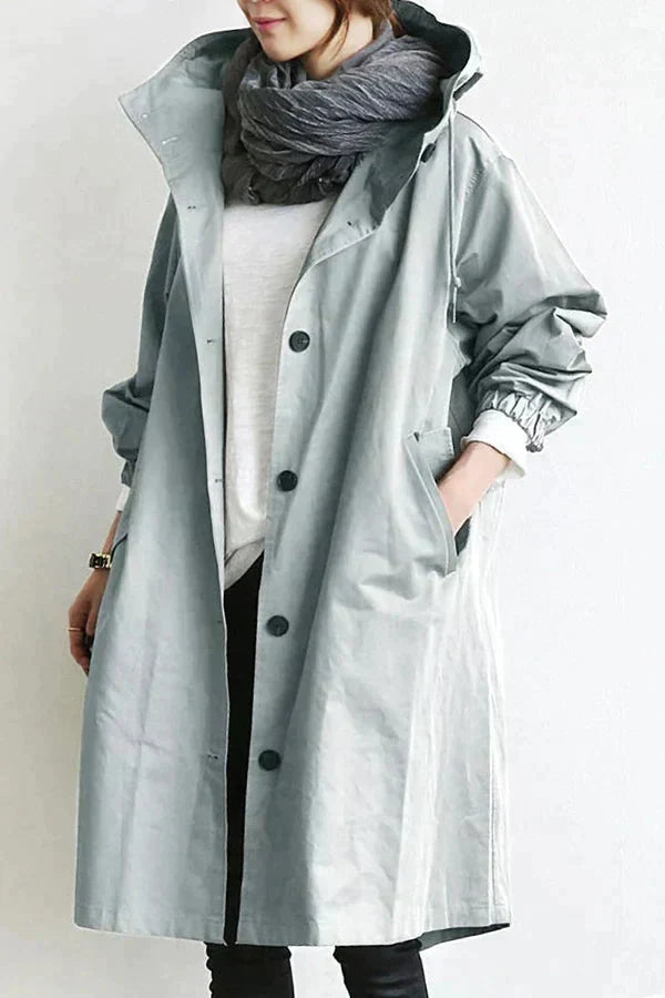 Women’s raincoat | Lightweight waterproof jacket | Hooded | Longline fit | Button closure