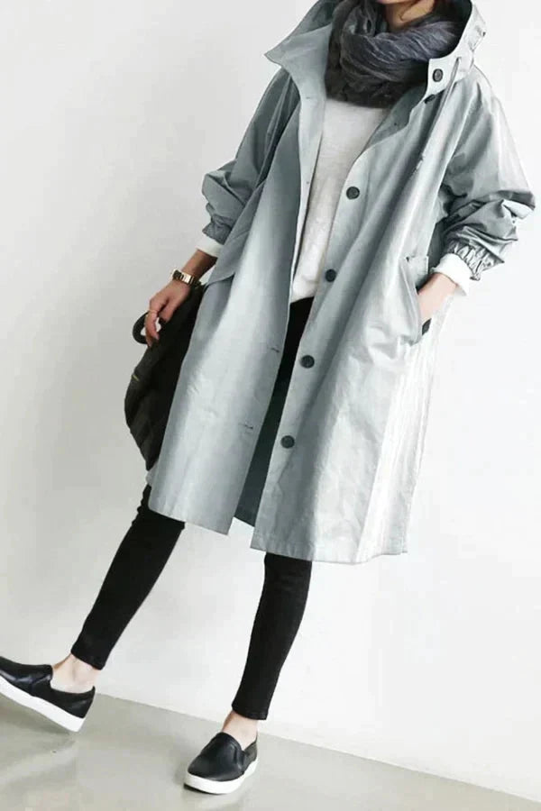 Women’s raincoat | Lightweight waterproof jacket | Hooded | Longline fit | Button closure